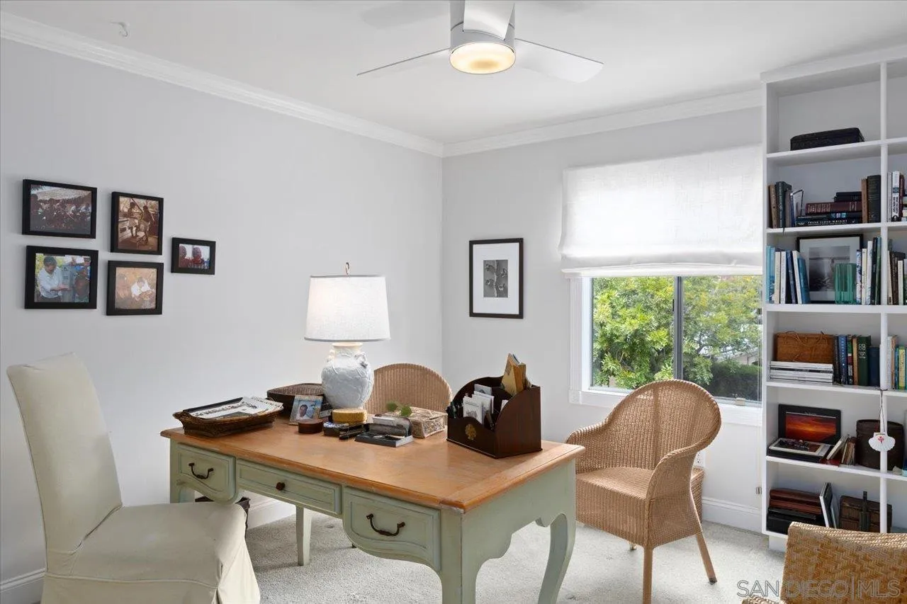 1763 Edgefield Lane Encinitas, CA 92024 - Photo 21 of 31 a view of a workspace with furniture and a potted plant