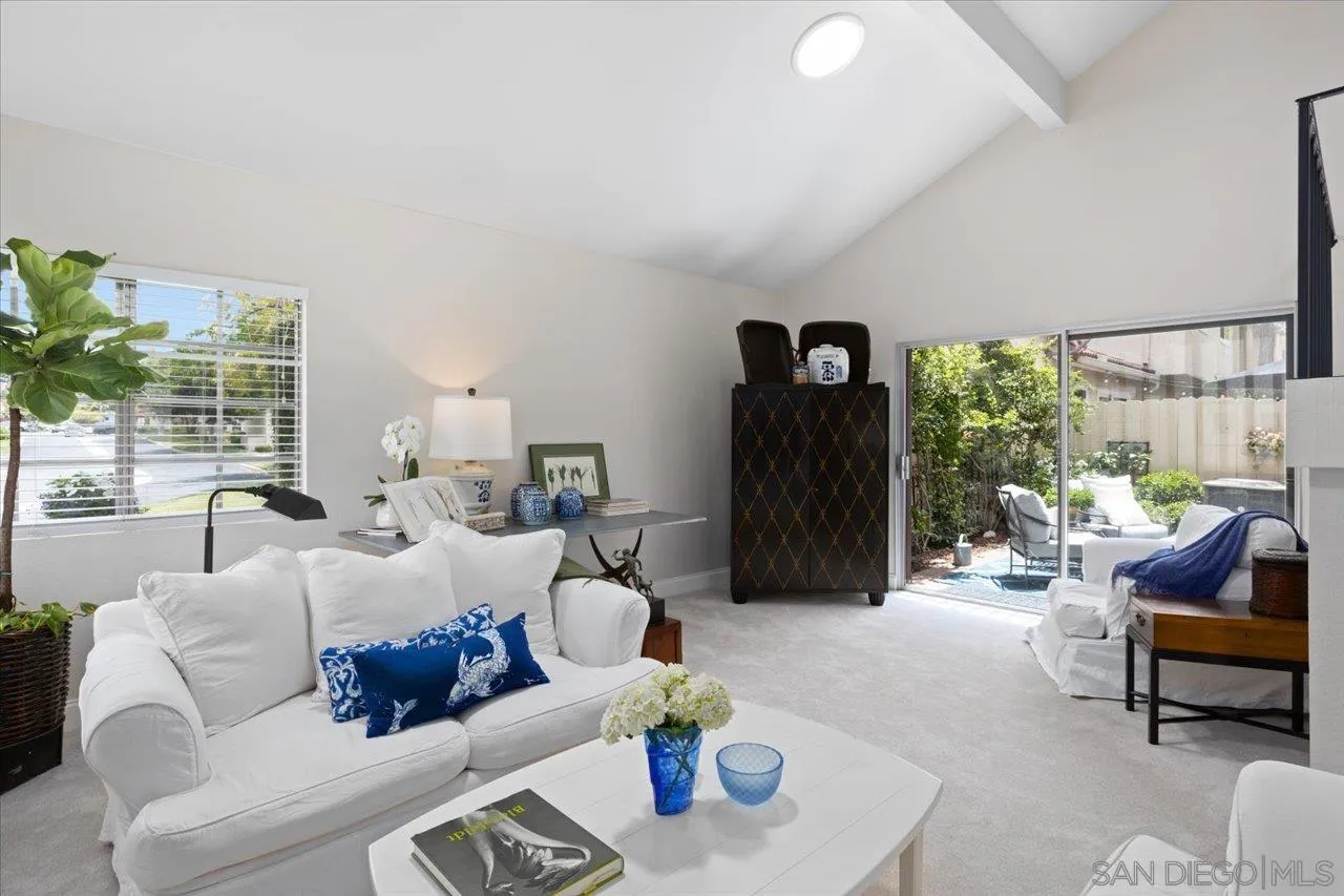 1763 Edgefield Lane Encinitas, CA 92024 - Photo 6 of 31 a living room with furniture and a large window