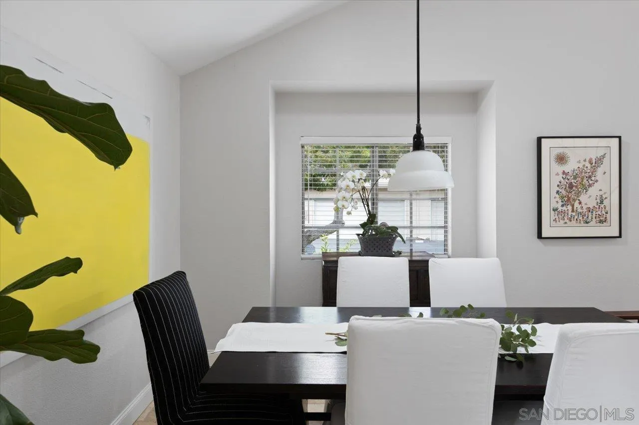 1763 Edgefield Lane Encinitas, CA 92024 - Photo 9 of 31 a dining room with furniture and window