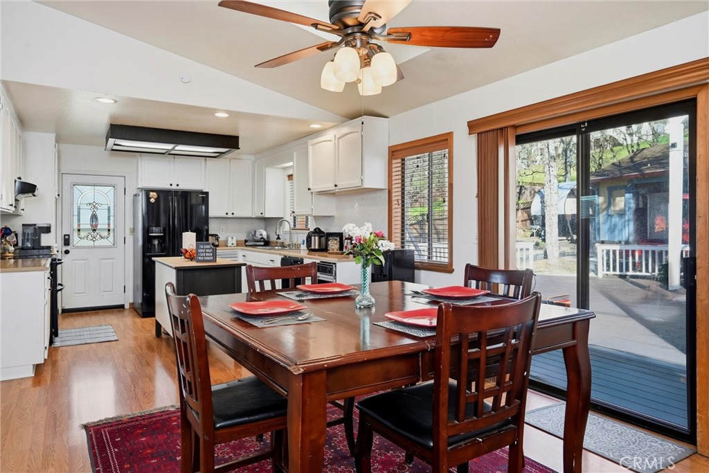 18712 Hidden Valley Road Hidden Valley Lake, CA 95467 - Photo 12 of 38 a view of a dining room with furniture window and outside view