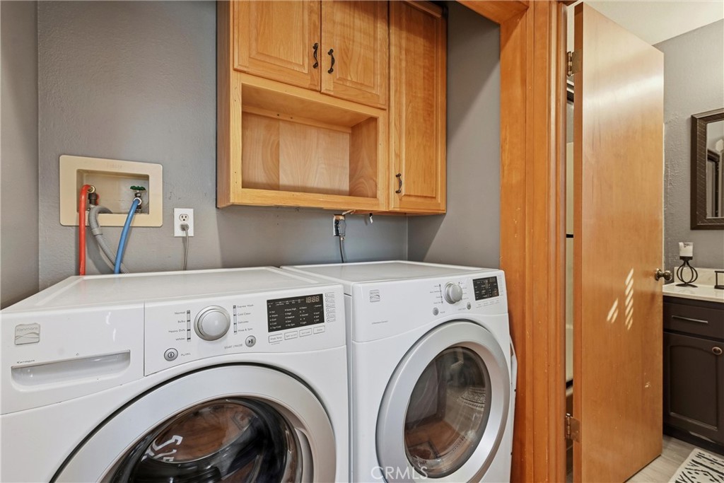 18712 Hidden Valley Road Hidden Valley Lake, CA 95467 - Photo 19 of 38 a utility room with dryer and washer