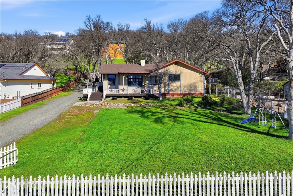 18712 Hidden Valley Road Hidden Valley Lake, CA 95467 - Photo 26 of 38 a front view of a house with garden