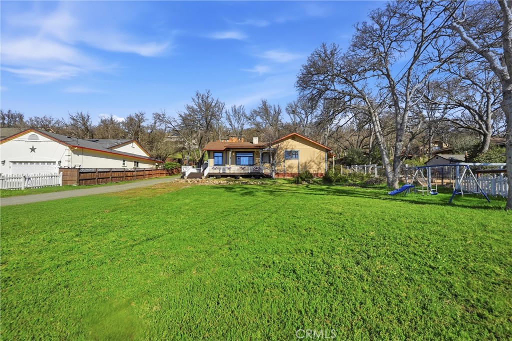 18712 Hidden Valley Road Hidden Valley Lake, CA 95467 - Photo 36 of 38 a view of house with garden and tall trees