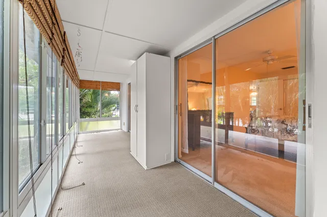 a view of a room with a large window