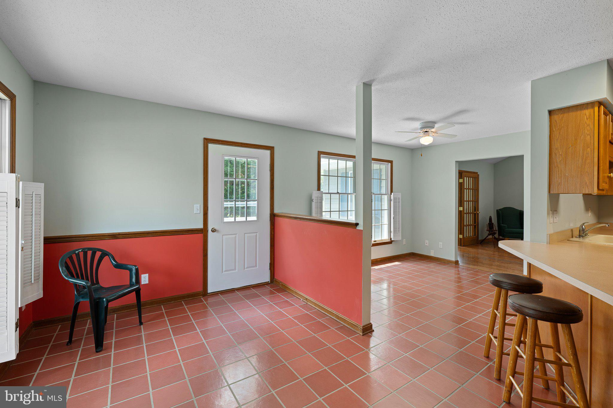 485 Bethany Loop Bethany Beach, DE 19930 - Photo 15 of 40 a view of an empty room with furniture and a window