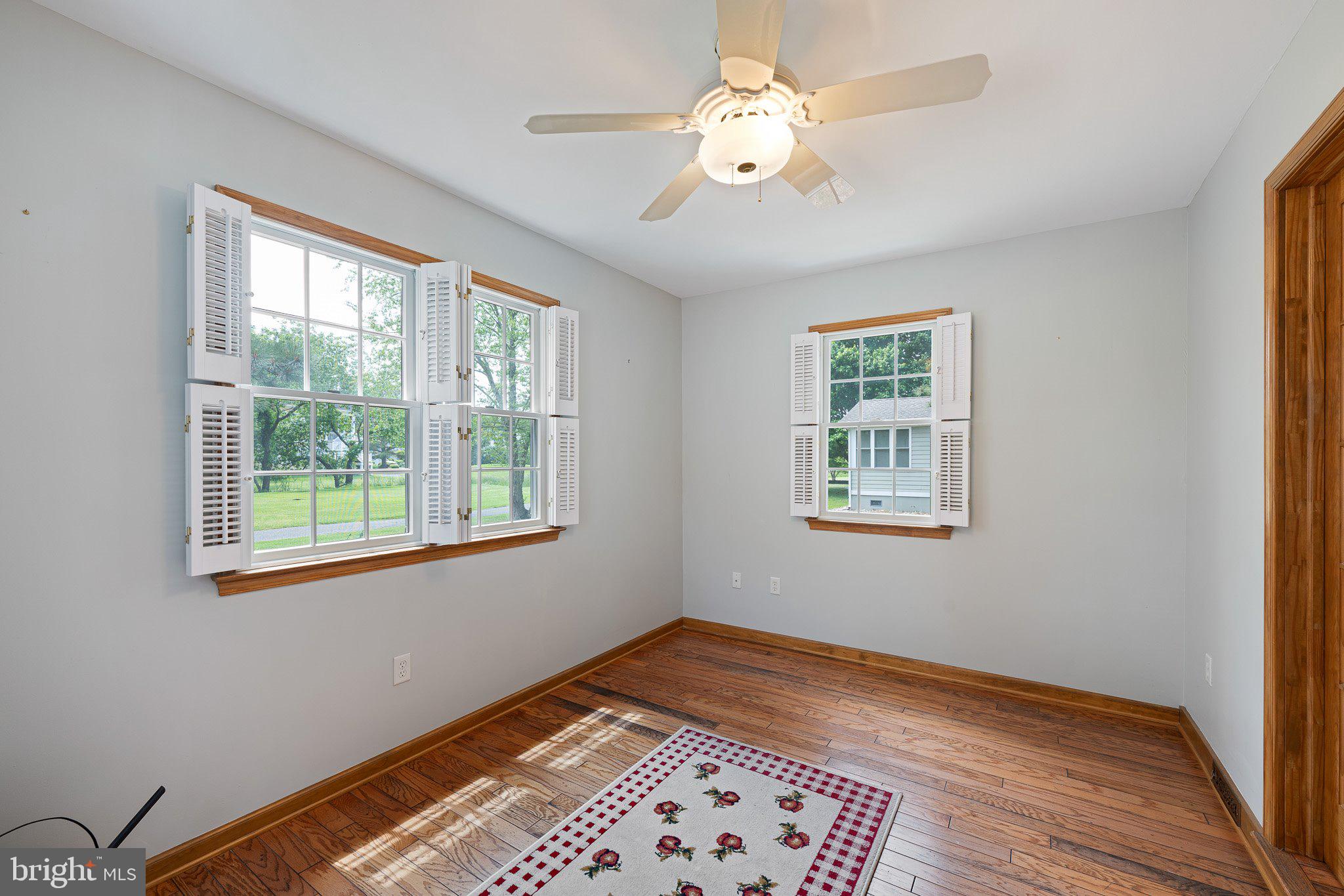 485 Bethany Loop Bethany Beach, DE 19930 - Photo 18 of 40 a view of a room with a window and wooden floor
