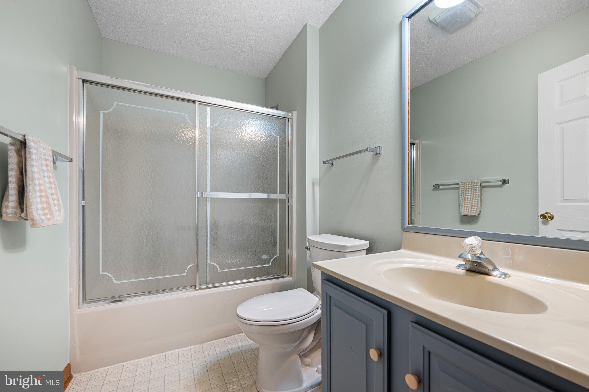 485 Bethany Loop Bethany Beach, DE 19930 - Photo 29 of 40 a bathroom with a sink toilet and shower
