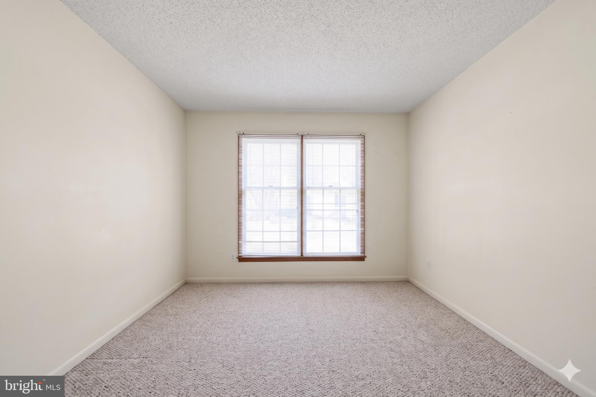 485 Bethany Loop Bethany Beach, DE 19930 - Photo 30 of 40 an empty room with a window