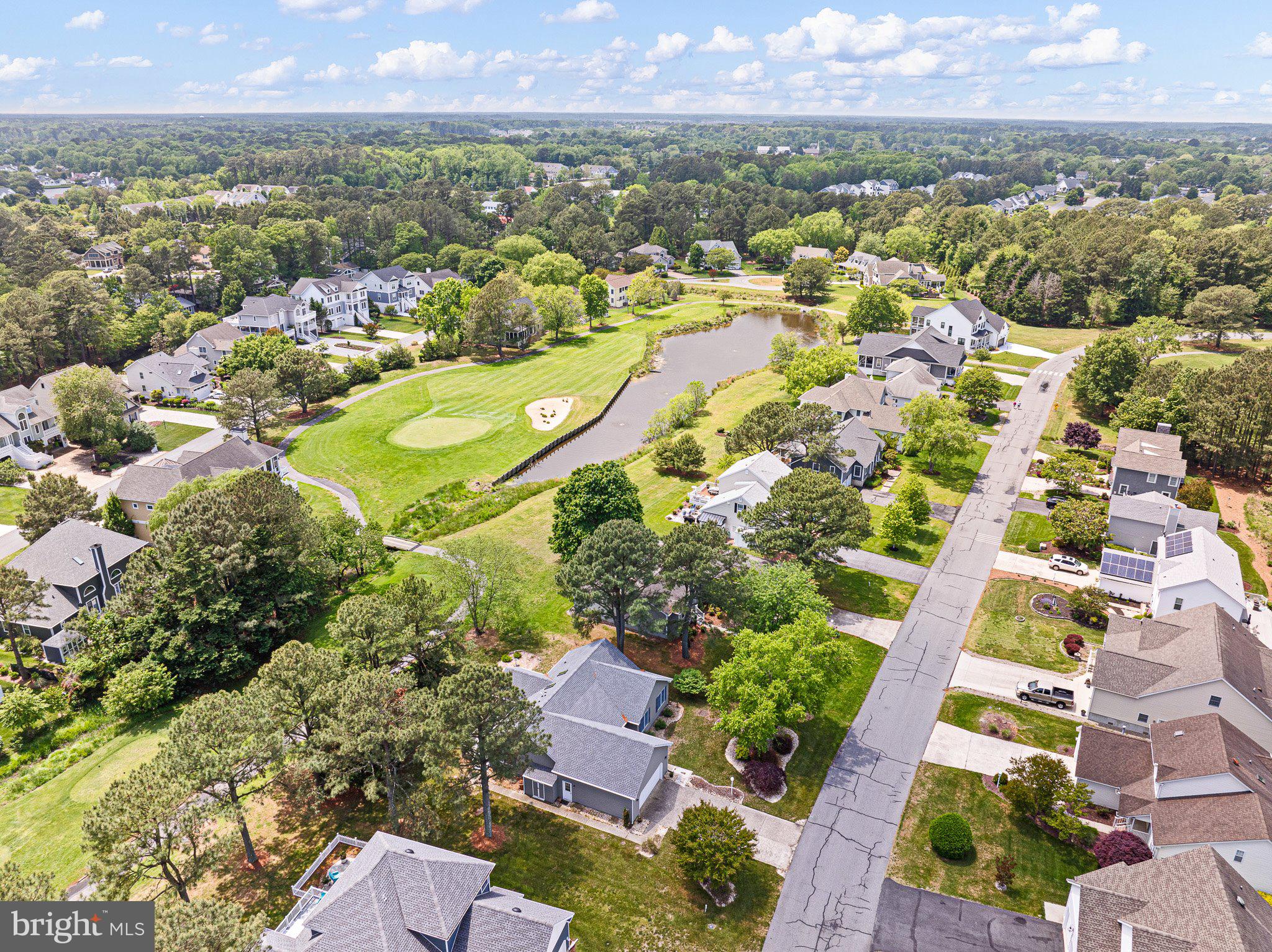485 Bethany Loop Bethany Beach, DE 19930 - Photo 39 of 40 an aerial view of residential houses with outdoor space and trees