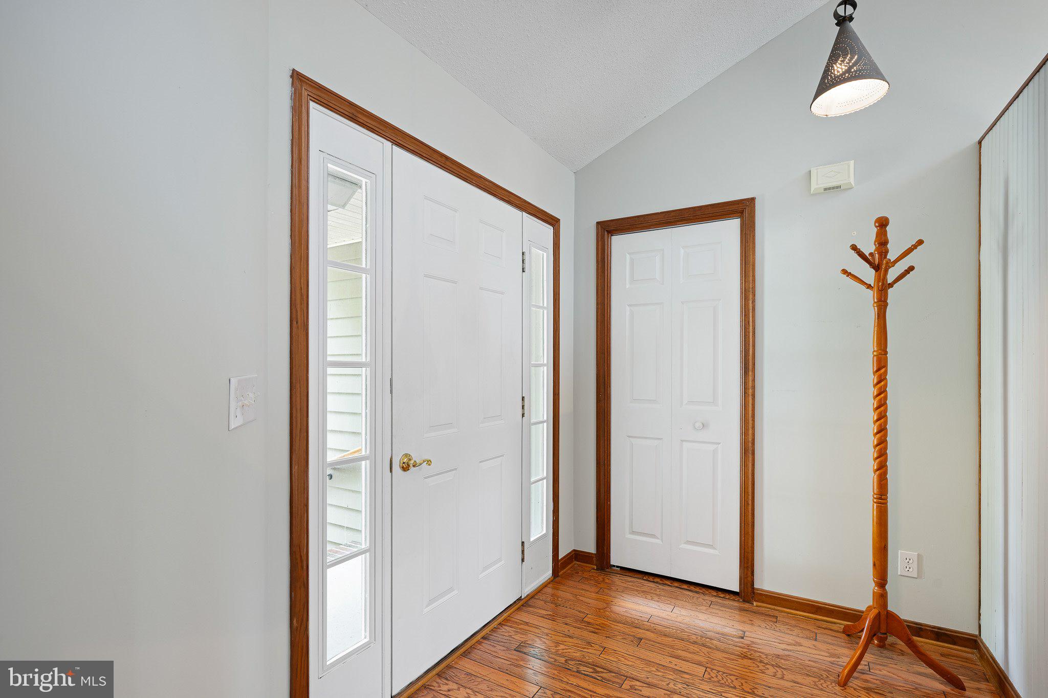 485 Bethany Loop Bethany Beach, DE 19930 - Photo 6 of 40 a view of a hallway with wooden floor