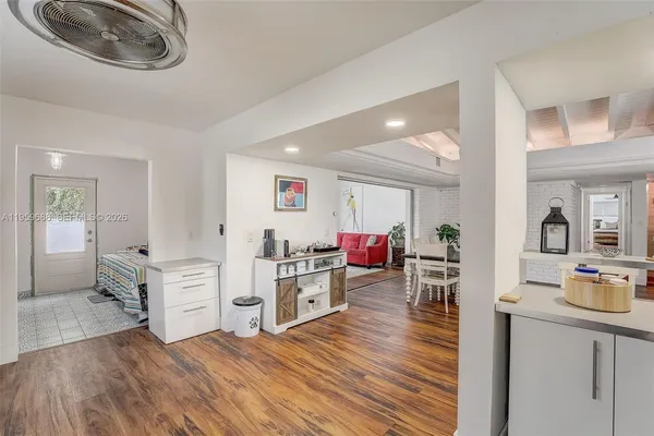 a room with furniture and a wooden floor