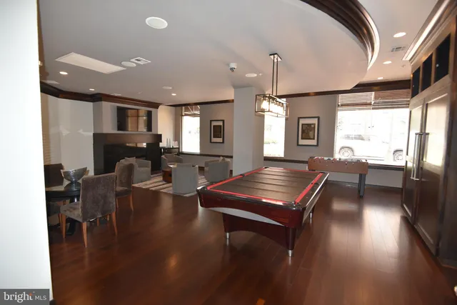 a view of a backyard with sitting area