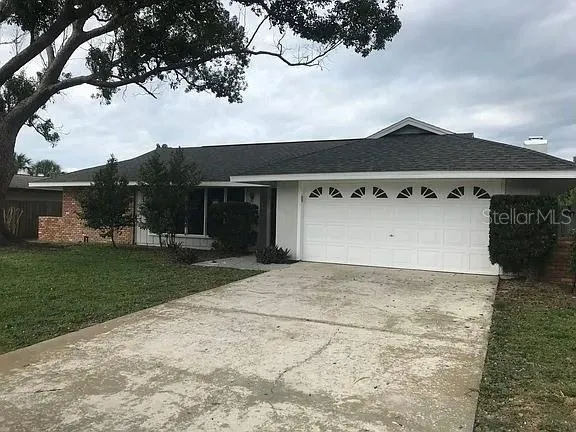 a house with trees in the background