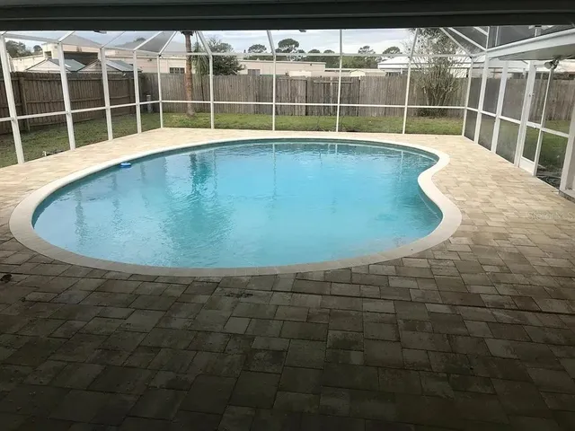 a view of outdoor space with swimming pool