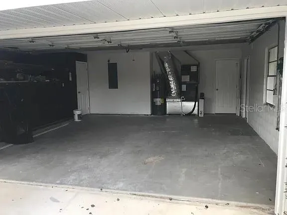 an empty room with wooden floor