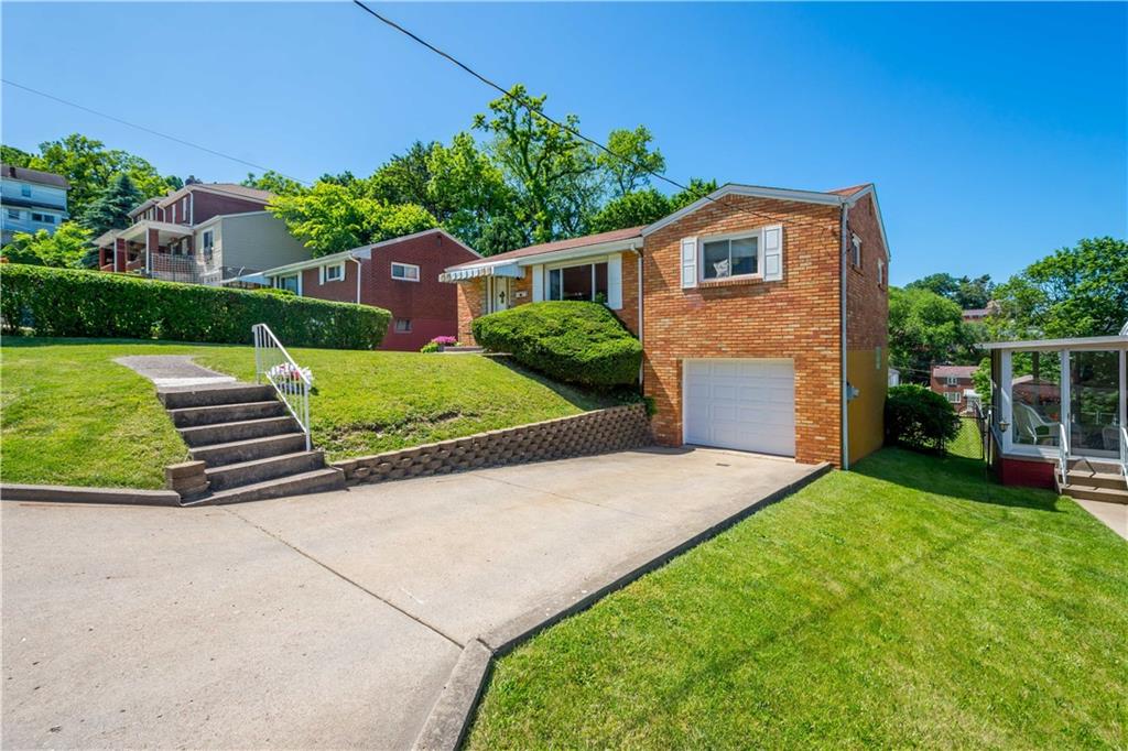 1230 Round Top Street Pittsburgh, PA 15205 - Photo 2 of 28 a front view of house with yard and green space