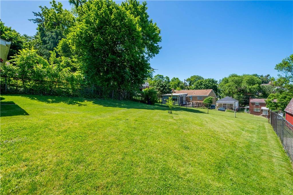 1230 Round Top Street Pittsburgh, PA 15205 - Photo 23 of 28 a view of a house with a backyard
