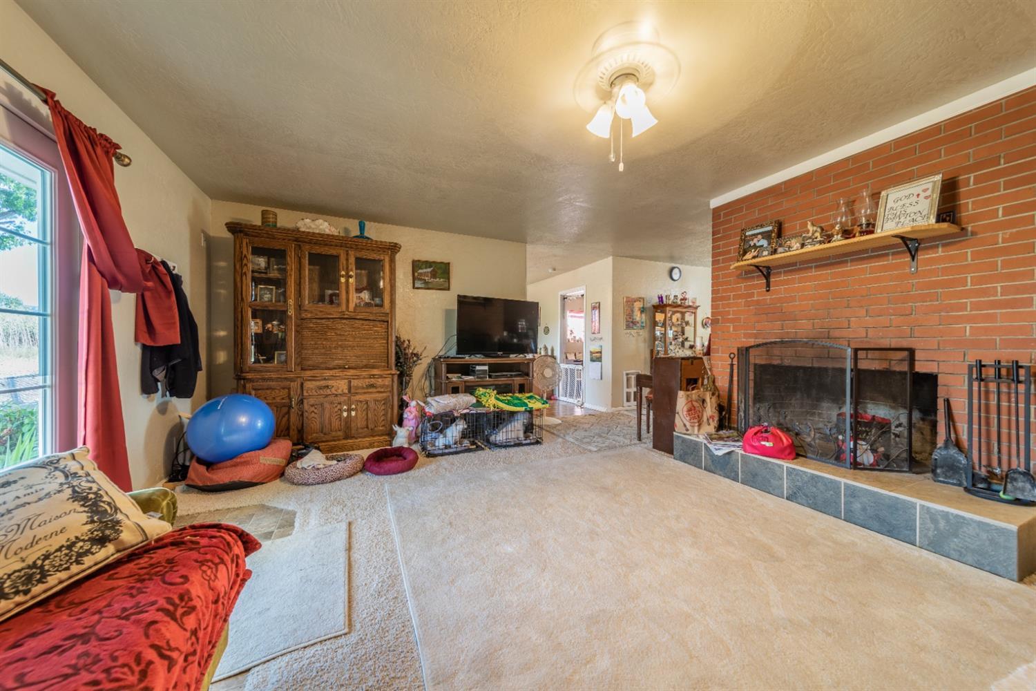 728 West Valley View Road Ashland, OR 97520 - Photo 17 of 32 a view of living room with furniture and a fireplace