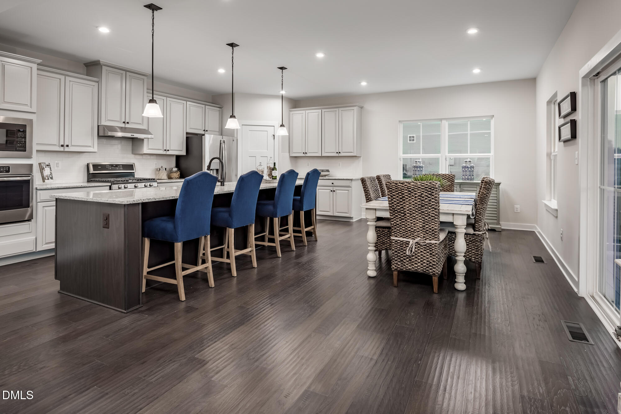 1709 Flint Hl Lane Raleigh, NC 27604 - Photo 3 of 29 a large kitchen with a table and chairs