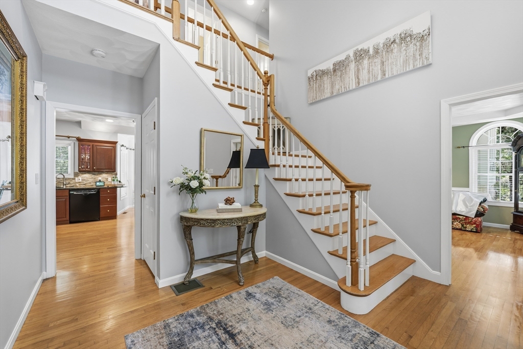 25 Haymeadow Road Boxford, MA 01921 - Photo 7 of 42 a view of entryway and hall with wooden floor