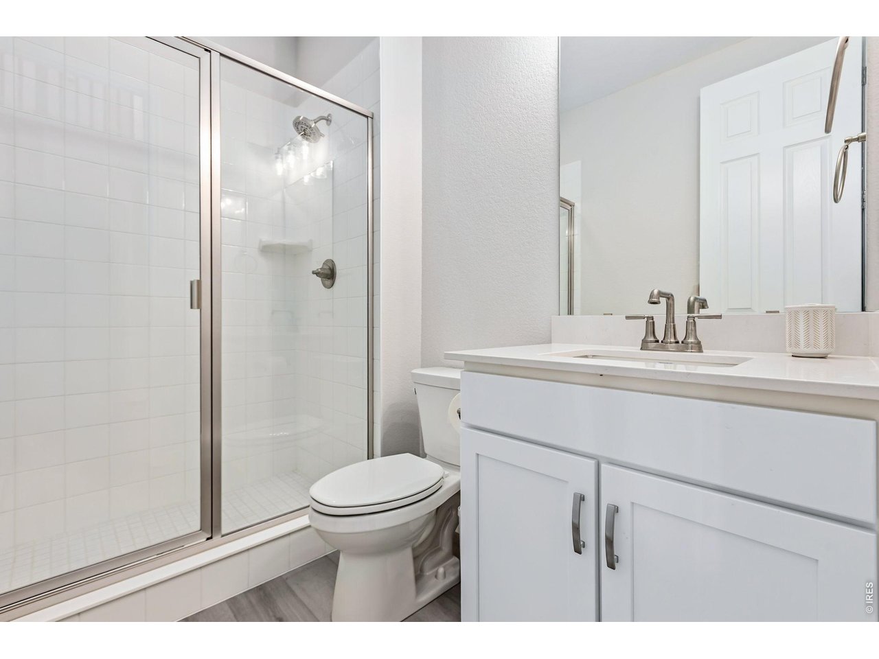 955 Rustling Street Windsor, CO 80550 - Photo 10 of 34 a bathroom with a sink toilet and shower