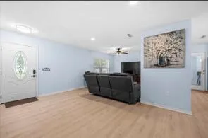 a view of a workspace with furniture