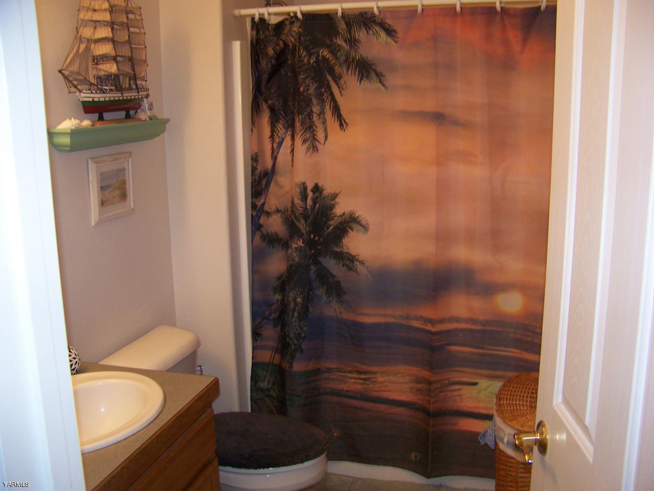 10811 Zier Road Yakima, WA 98908 - Photo 16 of 20 a bathroom with a toilet and a sink