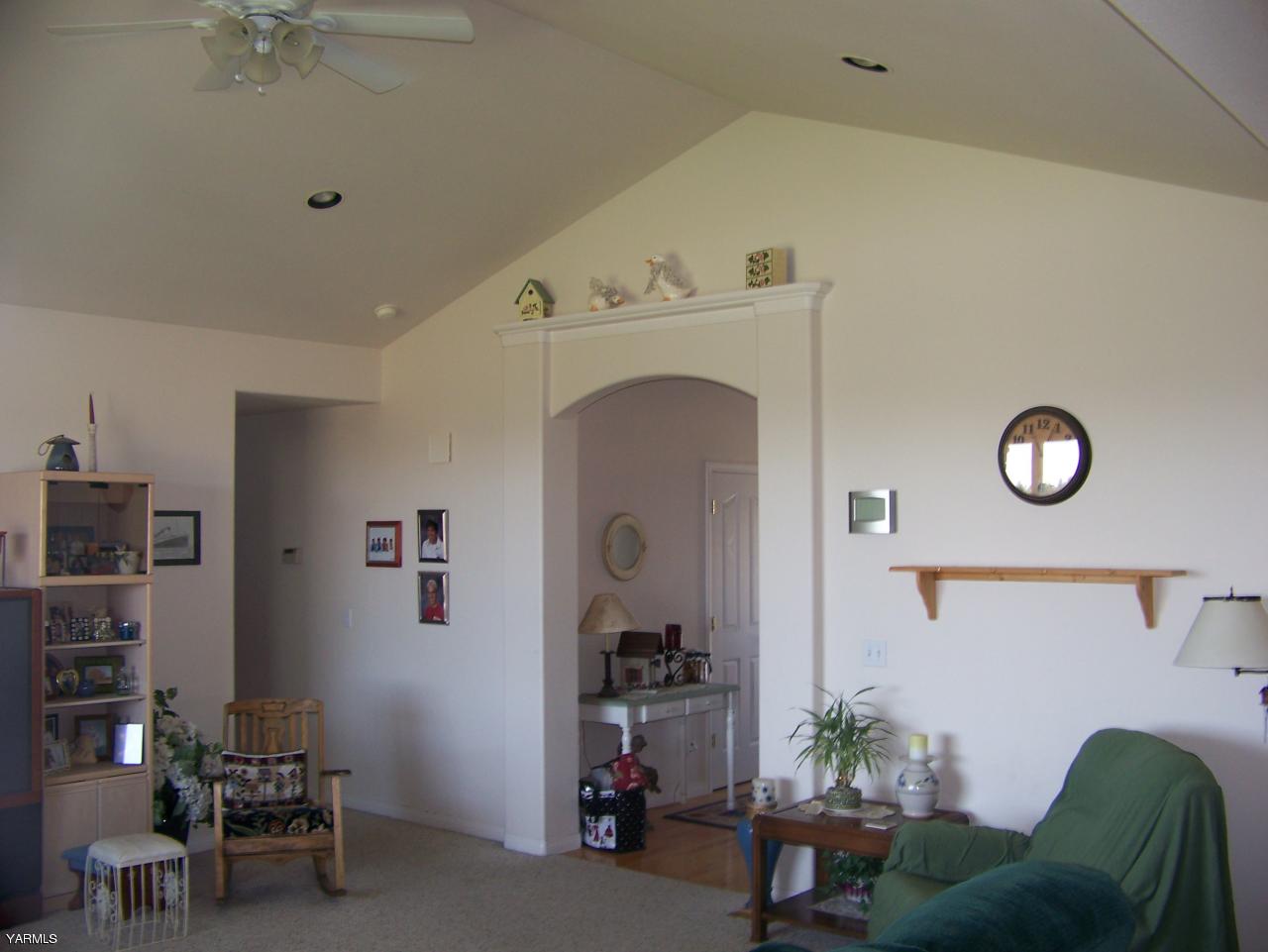 10811 Zier Road Yakima, WA 98908 - Photo 5 of 20 a view of livingroom with furniture and closet