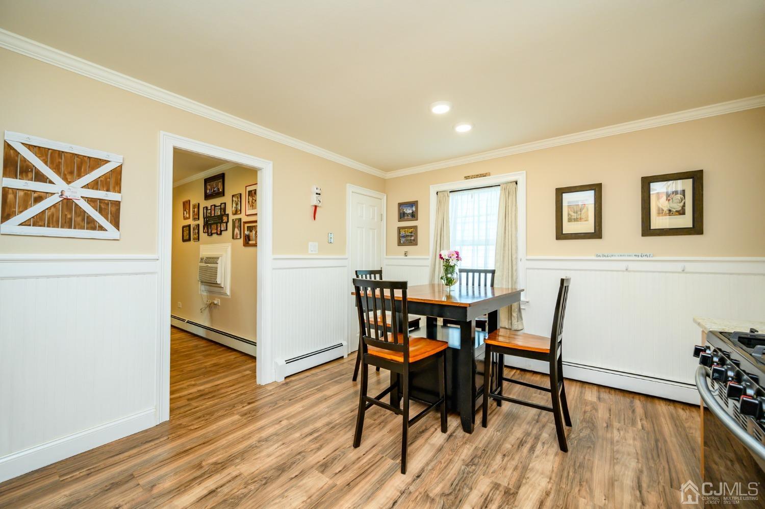 217 Clamer Road Ewing, NJ 08628 - Photo 12 of 29 a view of a dining room with furniture and wooden floor