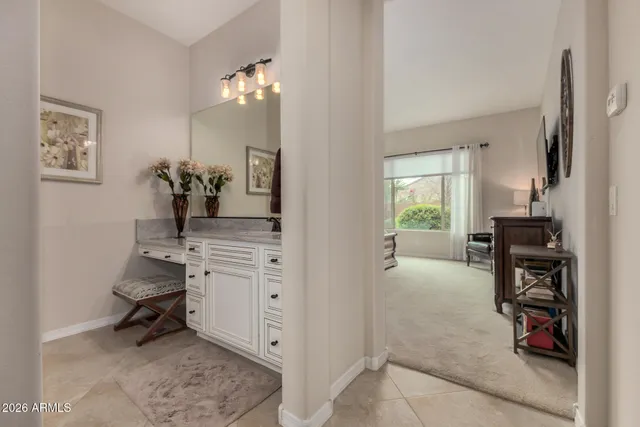 a living room with a couch and a flat screen tv