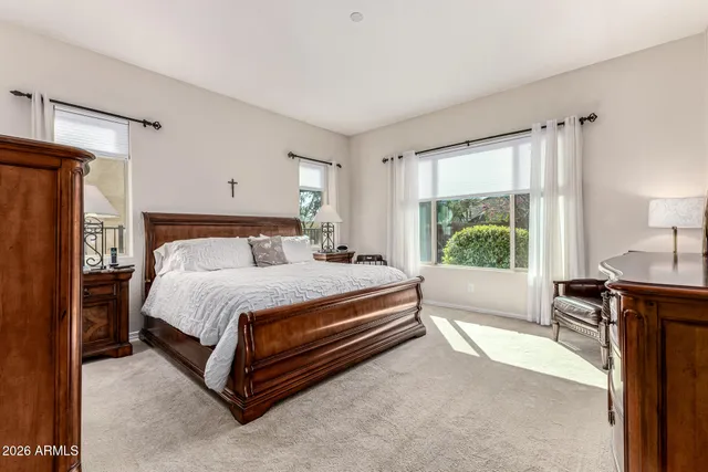 a view of a bathroom with tub and shower