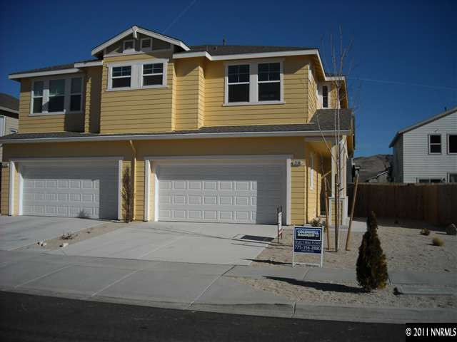 2150 Stanhope Lane Reno, NV 89502 - Photo 1 of 13 a front view of a house with a yard