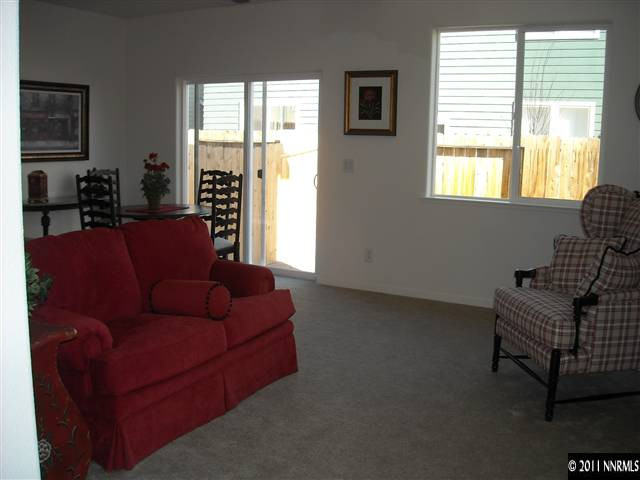 2150 Stanhope Lane Reno, NV 89502 - Photo 2 of 13 a living room with furniture and a window