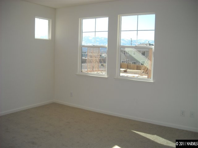 2150 Stanhope Lane Reno, NV 89502 - Photo 9 of 13 an empty room with a window
