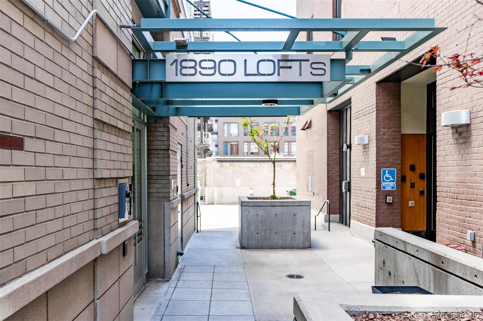 1890 Wynkoop Street, Unit 604 Denver, CO 80202 - Photo 1 of 26 a view of a street with an outdoor seating