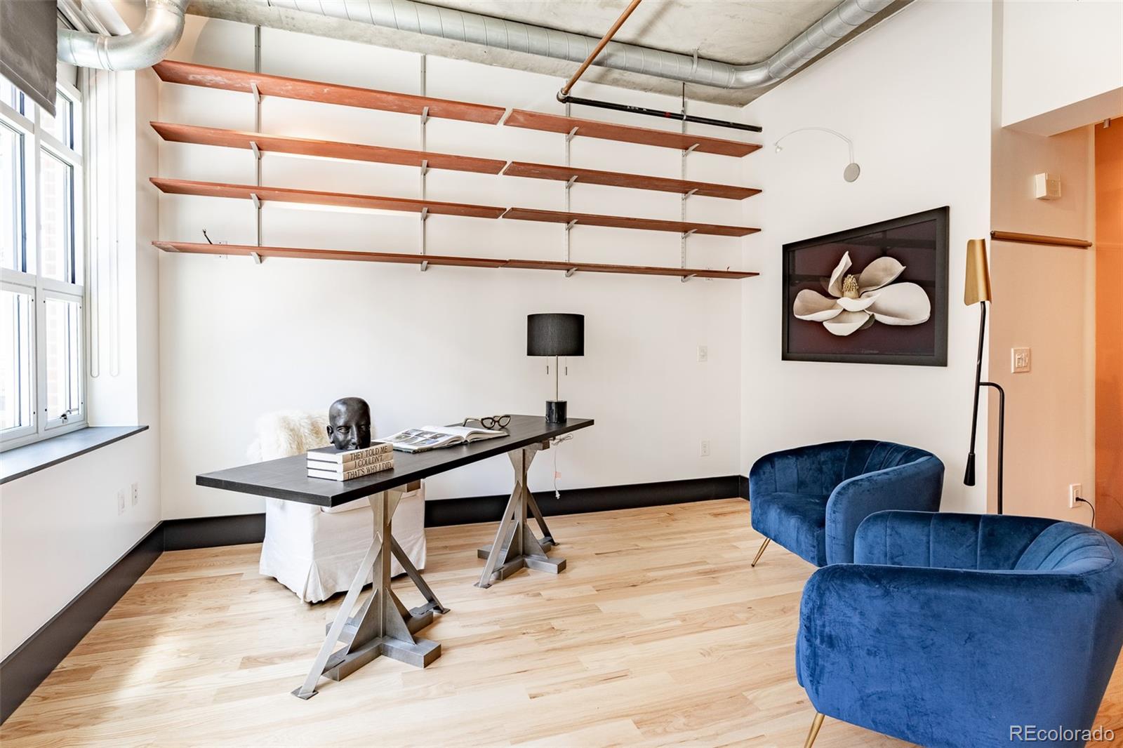 1890 Wynkoop Street, Unit 604 Denver, CO 80202 - Photo 11 of 26 a workspace with furniture and window