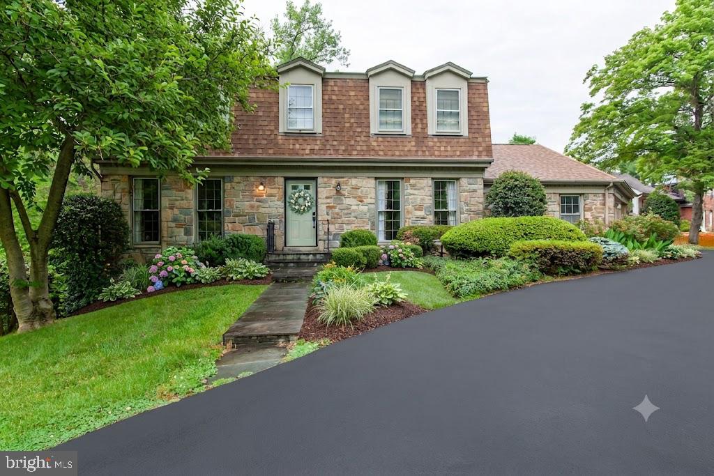 6034 Chesterbrook Road, Unit B McLean, VA 22101 - Photo 1 of 34 Charming stone home with lush gardens.