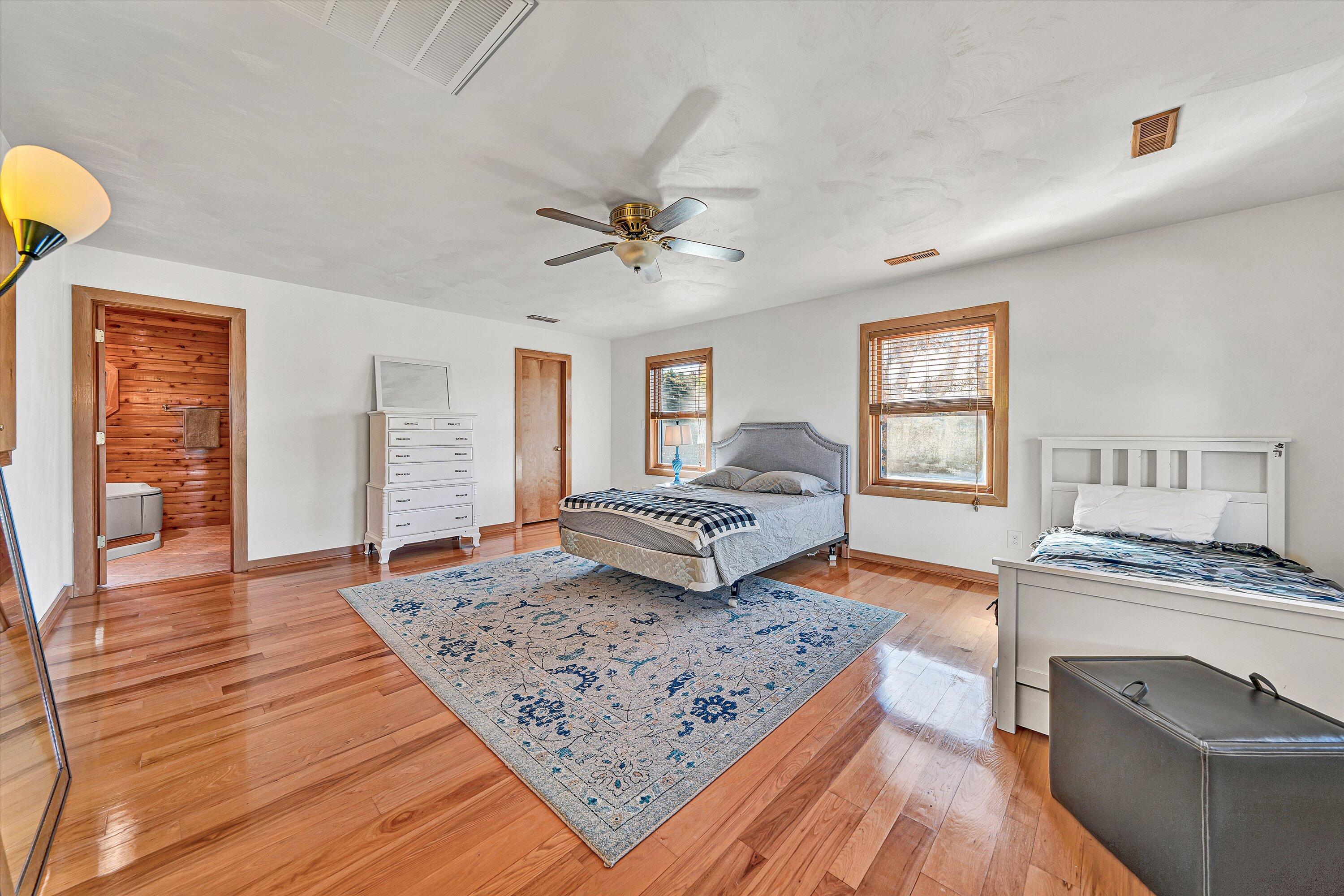 290 Winding Way Union Hall, VA 24176 - Photo 35 of 50 a bedroom with a bed and a couch