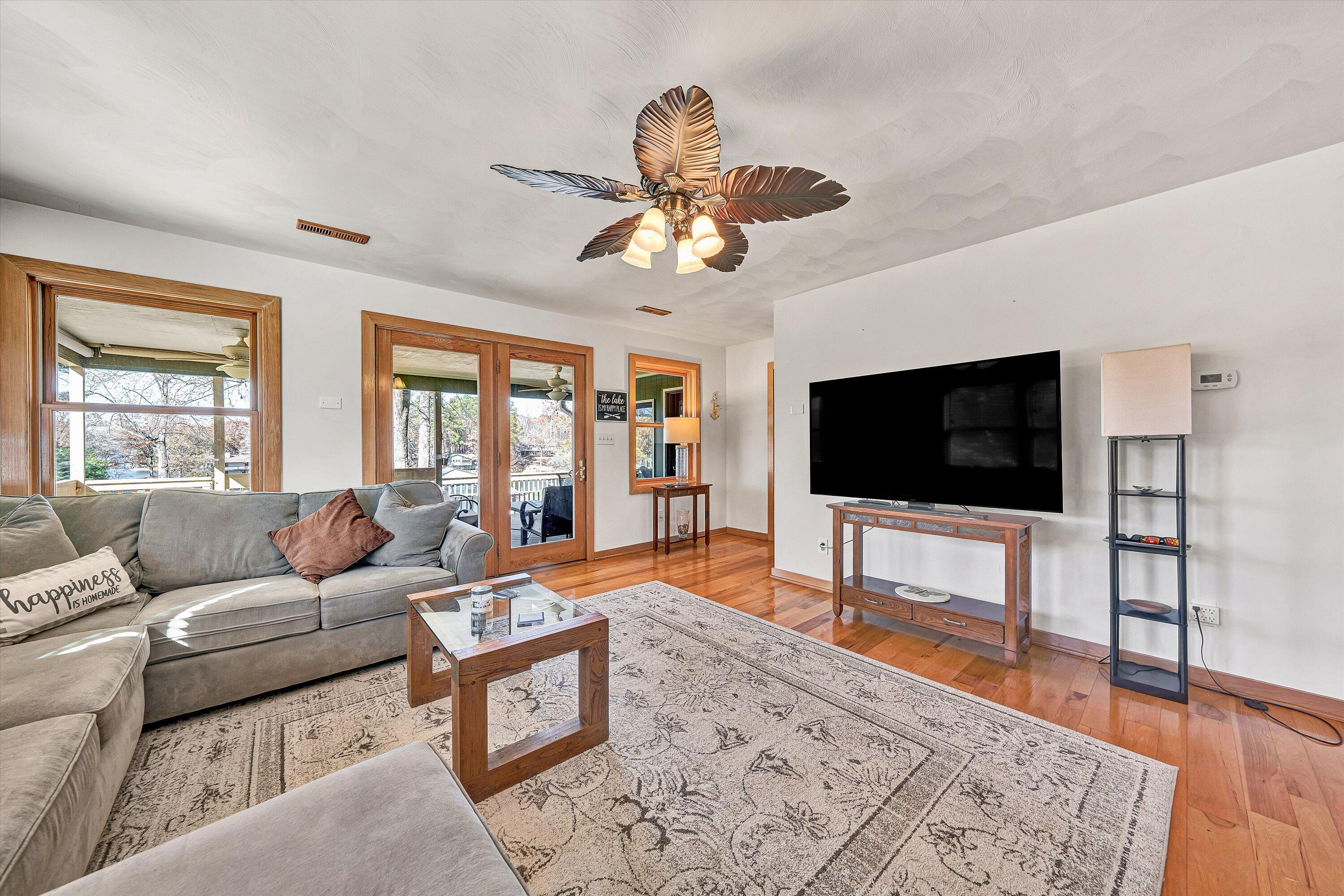 290 Winding Way Union Hall, VA 24176 - Photo 10 of 50 a living room with furniture and a flat screen tv