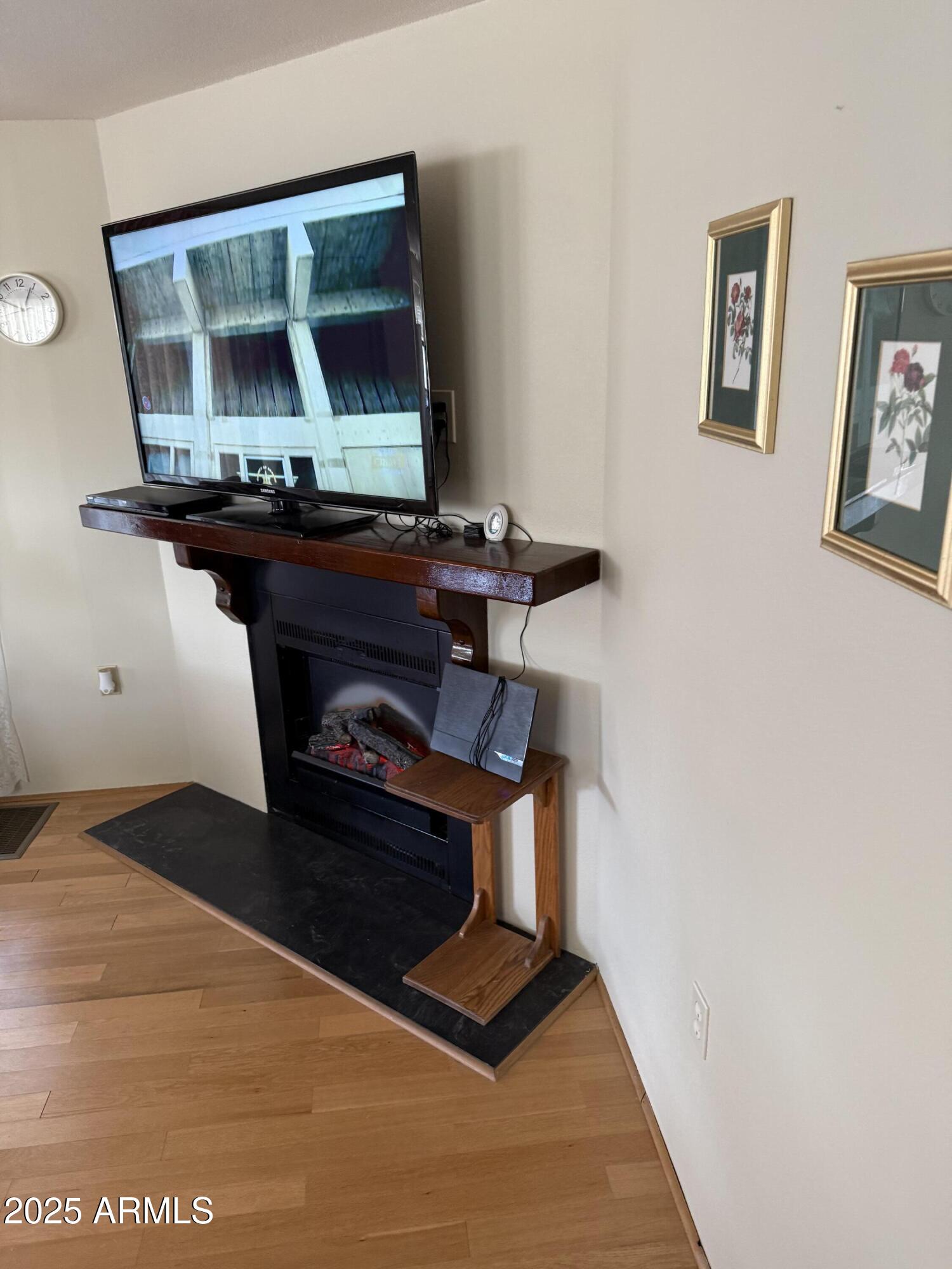 301 South Signal Butte Road, Unit FRNT Apache Junction, AZ 85120 - Photo 11 of 38 a living room with a piano and a table