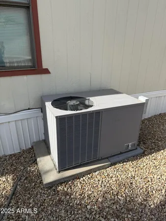 a stove top oven sitting inside of a kitchen
