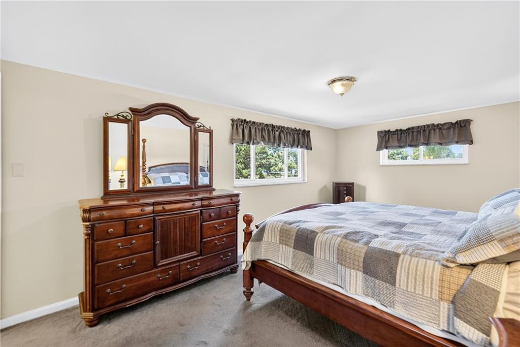 1705 Hassam Road Moon Township, PA 15108 - Photo 20 of 36 a bedroom with a bed and a dresser