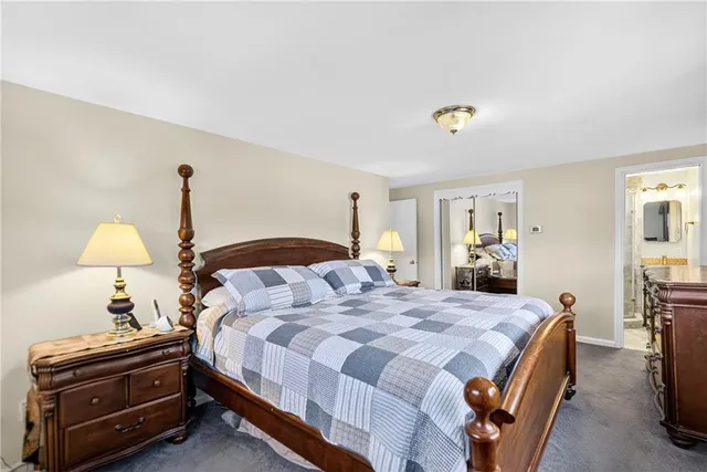 a bathroom with a shower and a sink