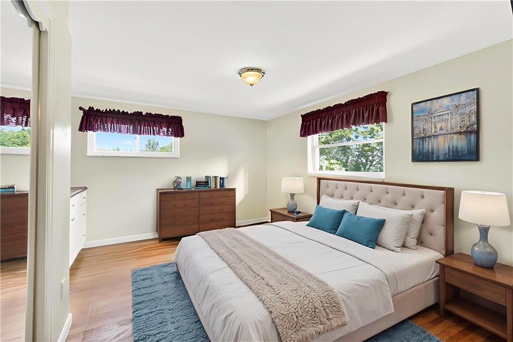 1705 Hassam Road Moon Township, PA 15108 - Photo 27 of 36 a bedroom with a bed and a window