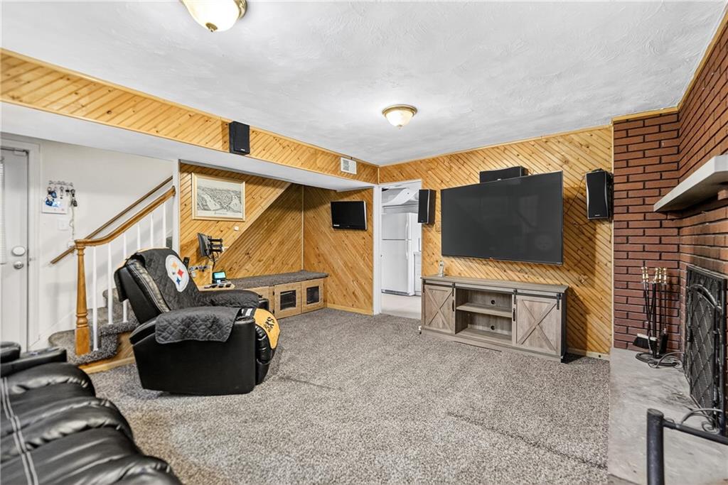 1705 Hassam Road Moon Township, PA 15108 - Photo 31 of 36 a living room with furniture and a flat screen tv