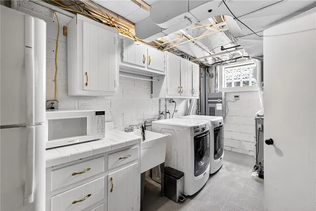 a view of a patio with chairs and table in the patio