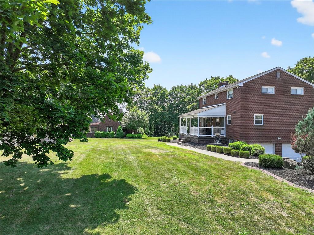 1705 Hassam Road Moon Township, PA 15108 - Photo 35 of 36 a house view with a garden space