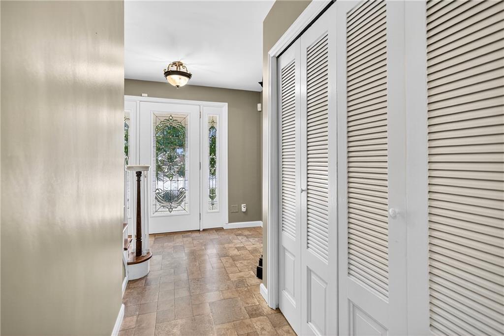 1705 Hassam Road Moon Township, PA 15108 - Photo 9 of 36 a view of a hallway with wooden shelves