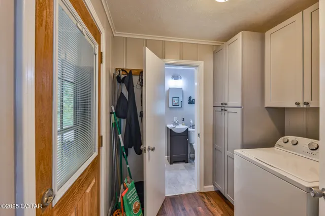 a view of storage and utility room with a washer and dryer