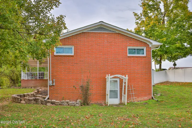 a front view of house with yard